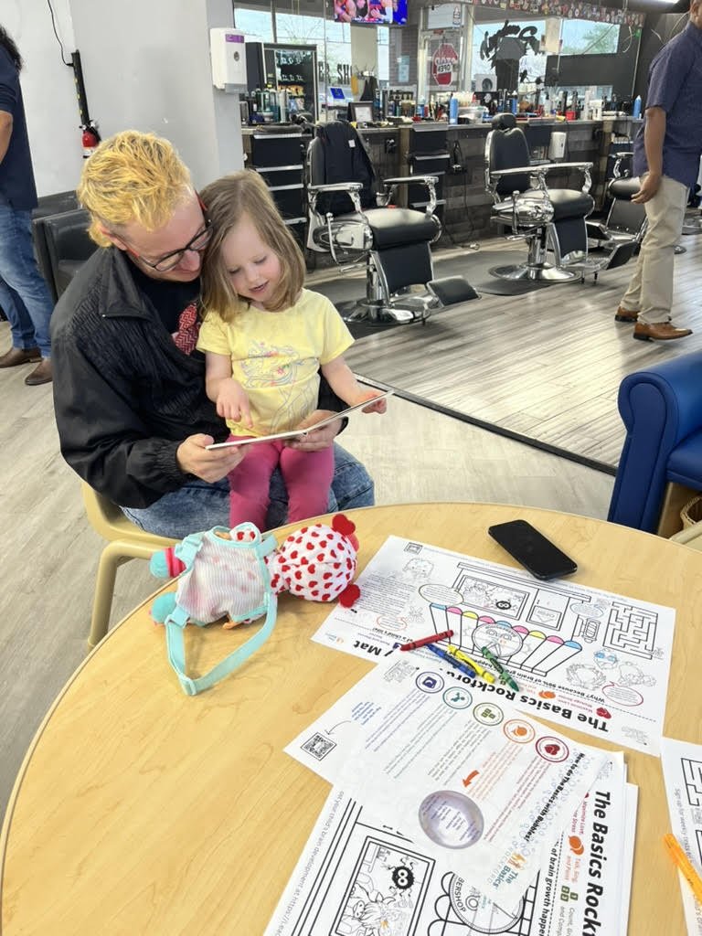 Children engaging with books through Alignment Rockford Ready to Learn initiative
