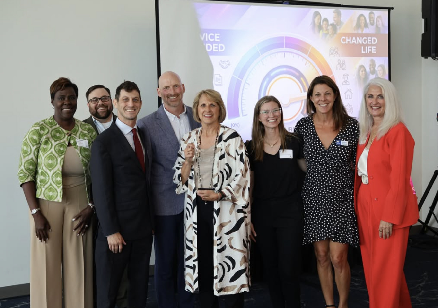 United Way Rock River Valley staff and community partners pose with the inaugural Partner in Education Award, presented by the Greater Rockford Chamber of Commerce, recognizing the organization's commitment to advancing education and literacy in the Rockford Region.