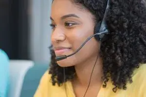call center employee in a yellow shirt