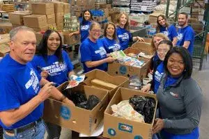 volunteers backing boxes for charity