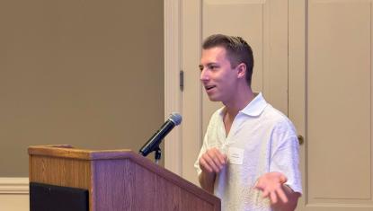 Zachary Furmanek speaking at the Tocqueville dinner